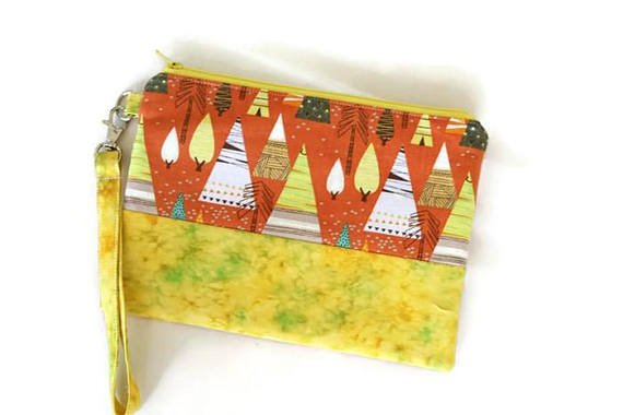 ItsSewYouDear's tweet photo. Orange and yellow zippered iphone wristlet. Whimsical trees clutch purse. Gift for her under 30. by ItsSewYouDear https://t.co/jEnmTdmYMU #etsyseller #etsymntt #handmade https://t.co/KRi6Z4pcIy