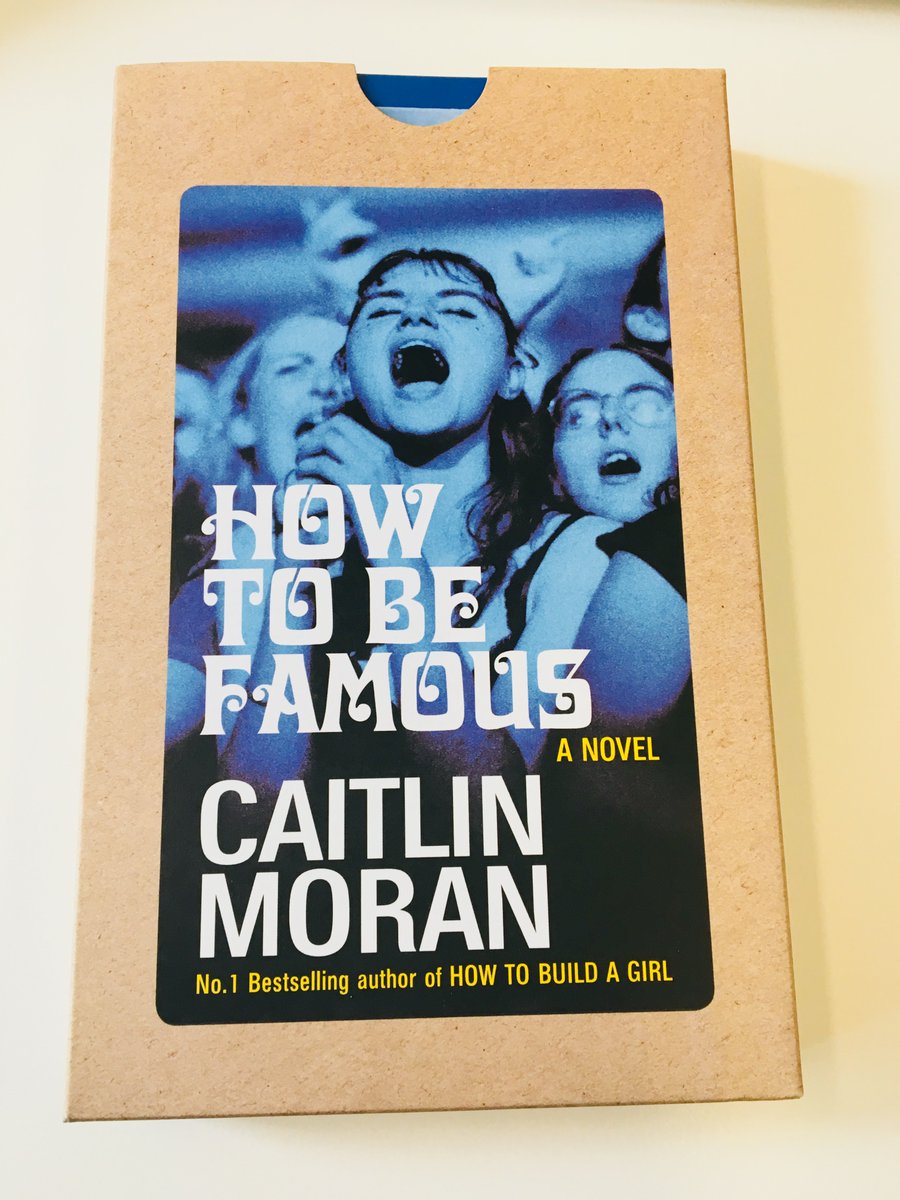 EmilyKitchin's tweet image. Oh my god, coolest proof ever! #HowtobeFamous by @caitlinmoran looks like a cassette coming out of a case, with blue-sprayed edges, songs on the back &amp;amp; an image which captures the Brit-pop era of the 90s SO perfectly. ❤️