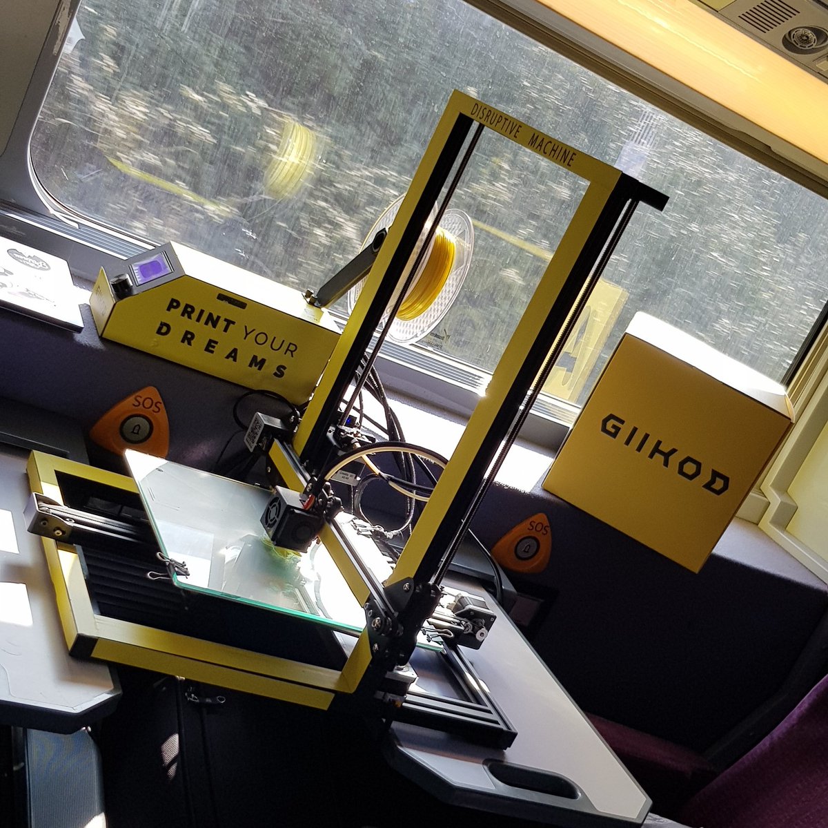 Giikod's tweet photo. It's happening, first 3D printer working in a train @imaginecc #express2018 @BernatBaste https://t.co/H2TMJasvWZ