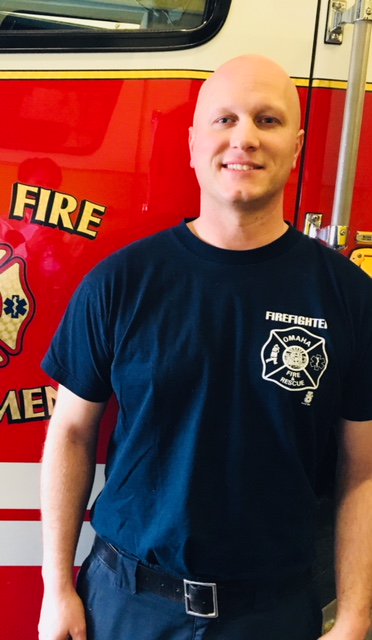 OmahaFireDept's tweet photo. #FirefighterFriday - introducing Nick Winey. An OFD firefighter for 10 years, Nick is Special Ops trained, an Army vet, and enjoys playing golf. Nick loves Engine work, and claims to have 'brownish' hair. Any @OPS_Burke grads have photos of Nick's frosted hair in 10th grade?? https://t.co/C9bjKcndAR