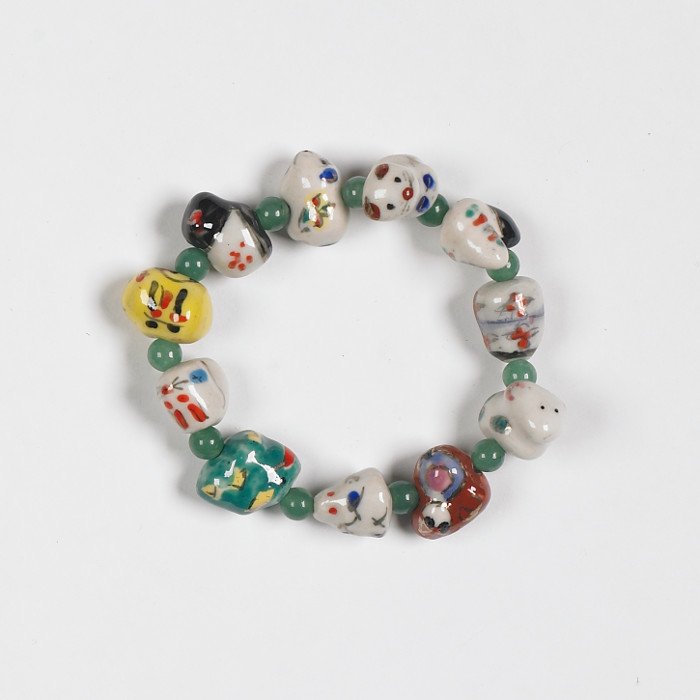World_Museum's tweet photo. This beautiful bracelet, part of our China’s First Emperor and the Terracotta Warriors merchandise range, features all of the animals which make up the Chinese zodiac, each with a painted face and a decorated body. Available to purchase online here: https://t.co/PORwICj7VJ https://t.co/neFPwF0a61