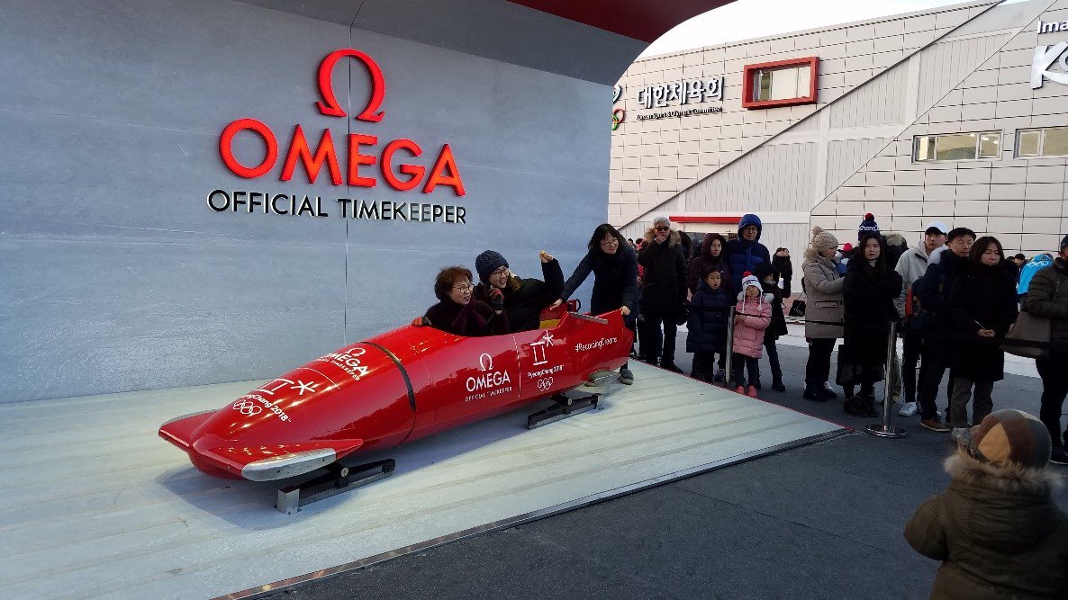 SponsorEye's tweet photo. Sometimes simple is best. @Omega keeps it running fast with a bob-sled photo op #sponsorship #Olympics2018 #activation https://t.co/k77BBaJipP