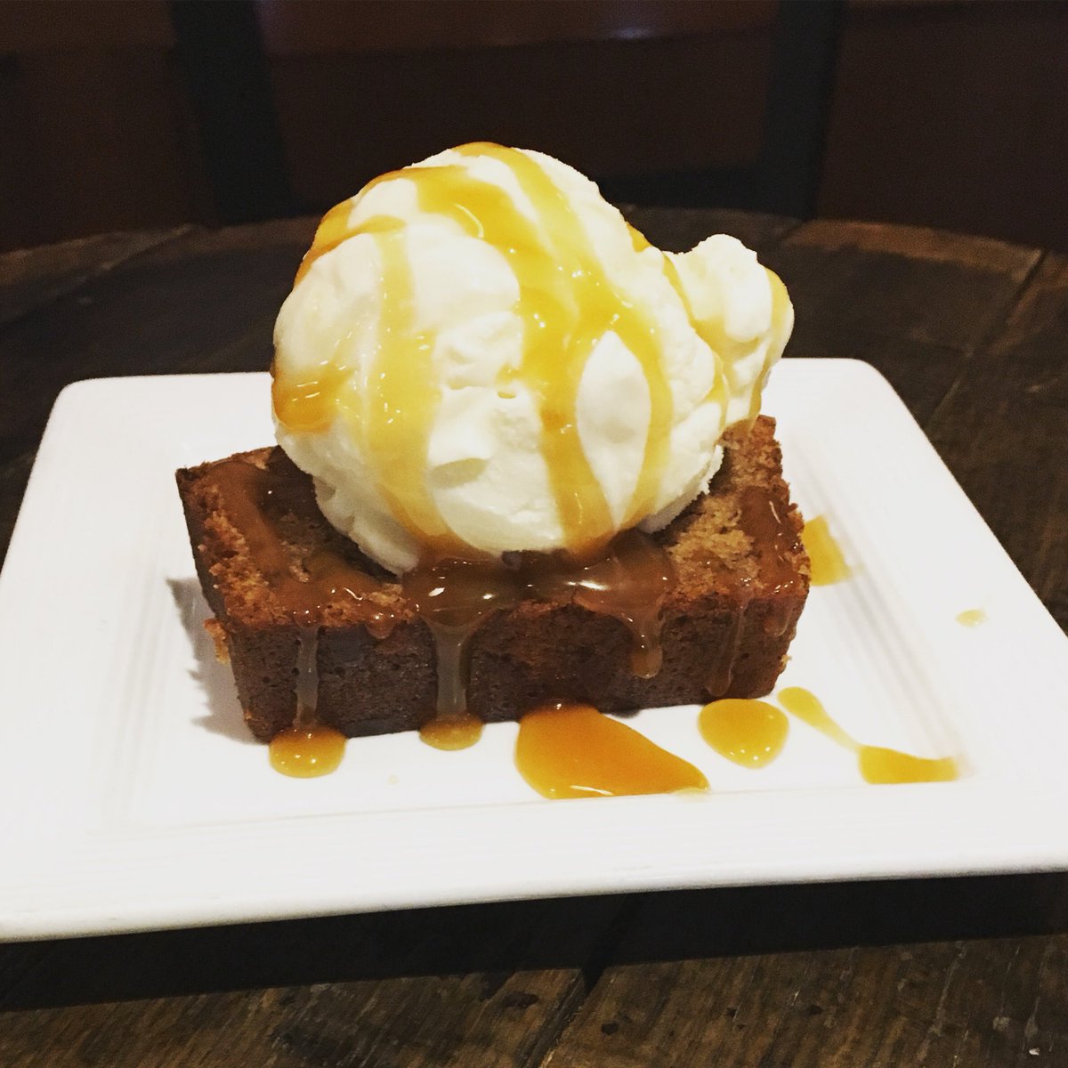 GUBulldogTavern's tweet photo. When it’s National Banana Bread Day, you gotta do it right. Our banana bread is topped with vanilla ice cream and a caramel drizzle! 😋 🍌🍦💙 #nationalbananabreadday https://t.co/a94eDLot3x