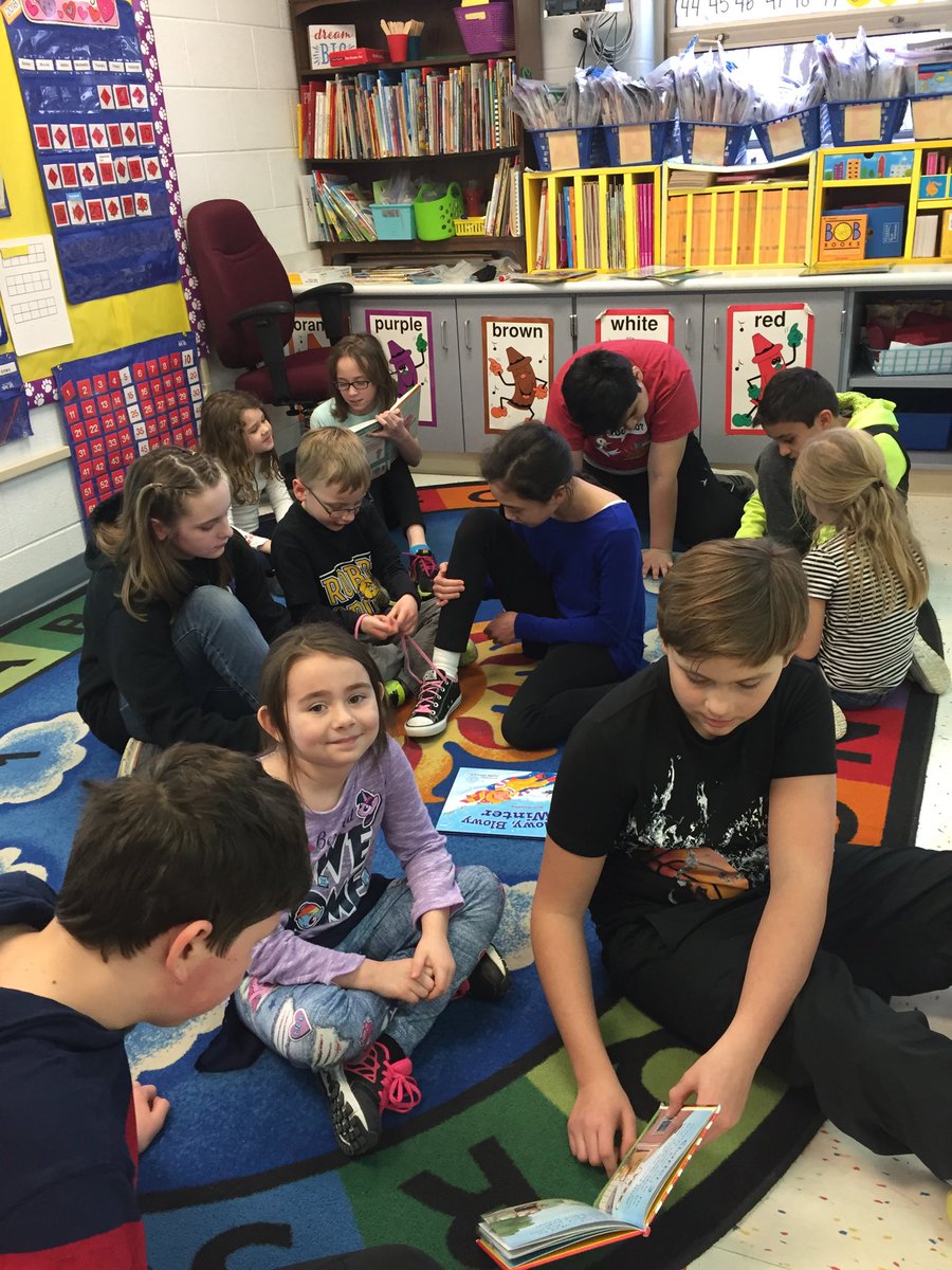 bulgarelliRCSK's tweet photo. Our 5th grade buddies came to read to kindergarten and help us tie shoes! ❤️our 5th graders! #RobertCS118 #RCS118life @OneGoalin5th https://t.co/WgtBZf78d1