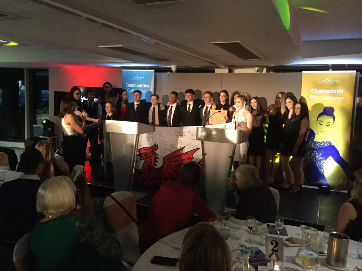 WelshGymnastics's tweet photo. Welsh flag signed by the community presented to team Wales https://t.co/2YEuiDbnxV