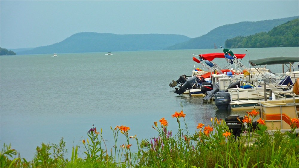 CooperstownFun's tweet image. View from Lakefront Park -- just a few minute's walk from Main Street in quaint Cooperstown, New York (home of the National Baseball Hall of Fame and Museum). See more at visitingcooperstown.com/otsego.html #cooperstown #otsegolake @carfulofkids @nomadicmatt @twodriftersxo