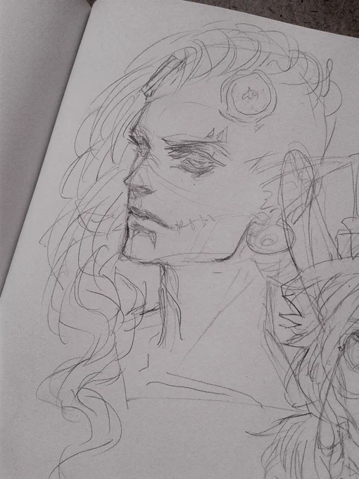 Headshot sketches scattered across my sketchbook. Drawing pretty guys is hard, must practice...always 