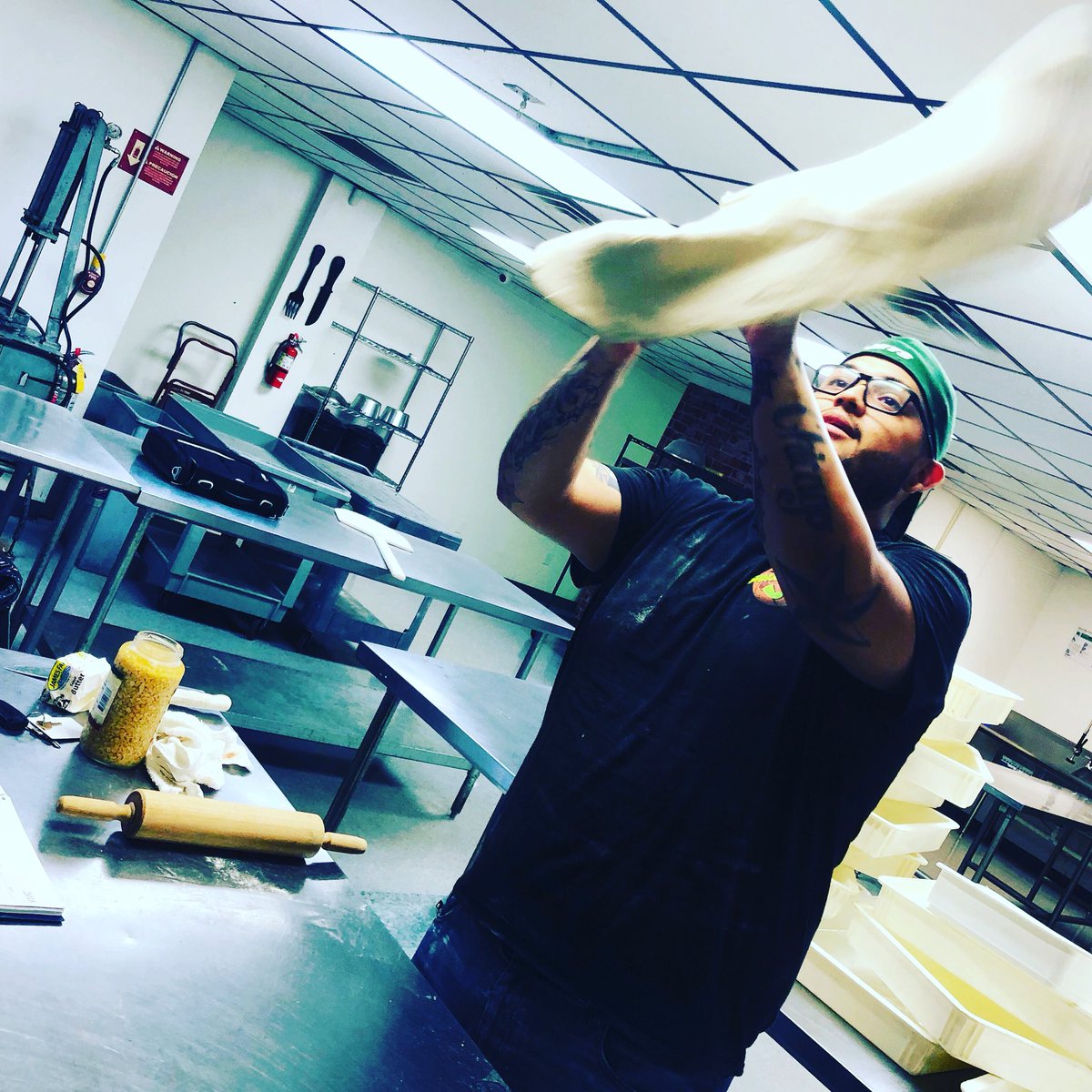 Our Chef Edgar spinning the dough