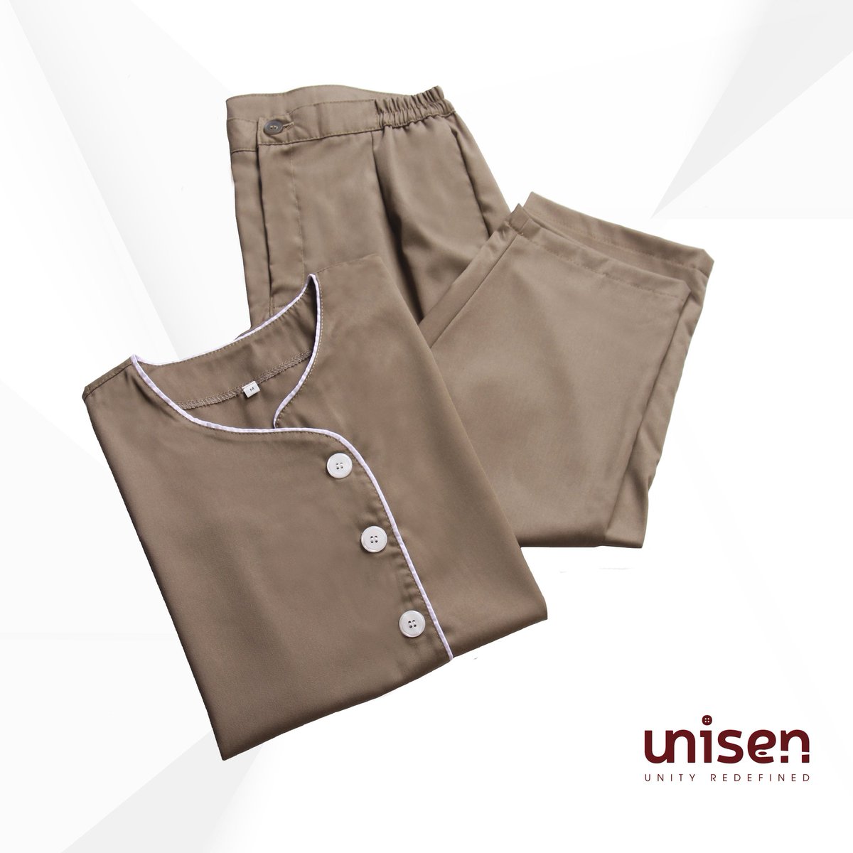 my_uniform's tweet photo. Premium breathable fabric and simple design make this Vinca Choco perfect for nannies to wear all the time they work. Grab this piece via our CS. https://t.co/1lGSKwH4ad