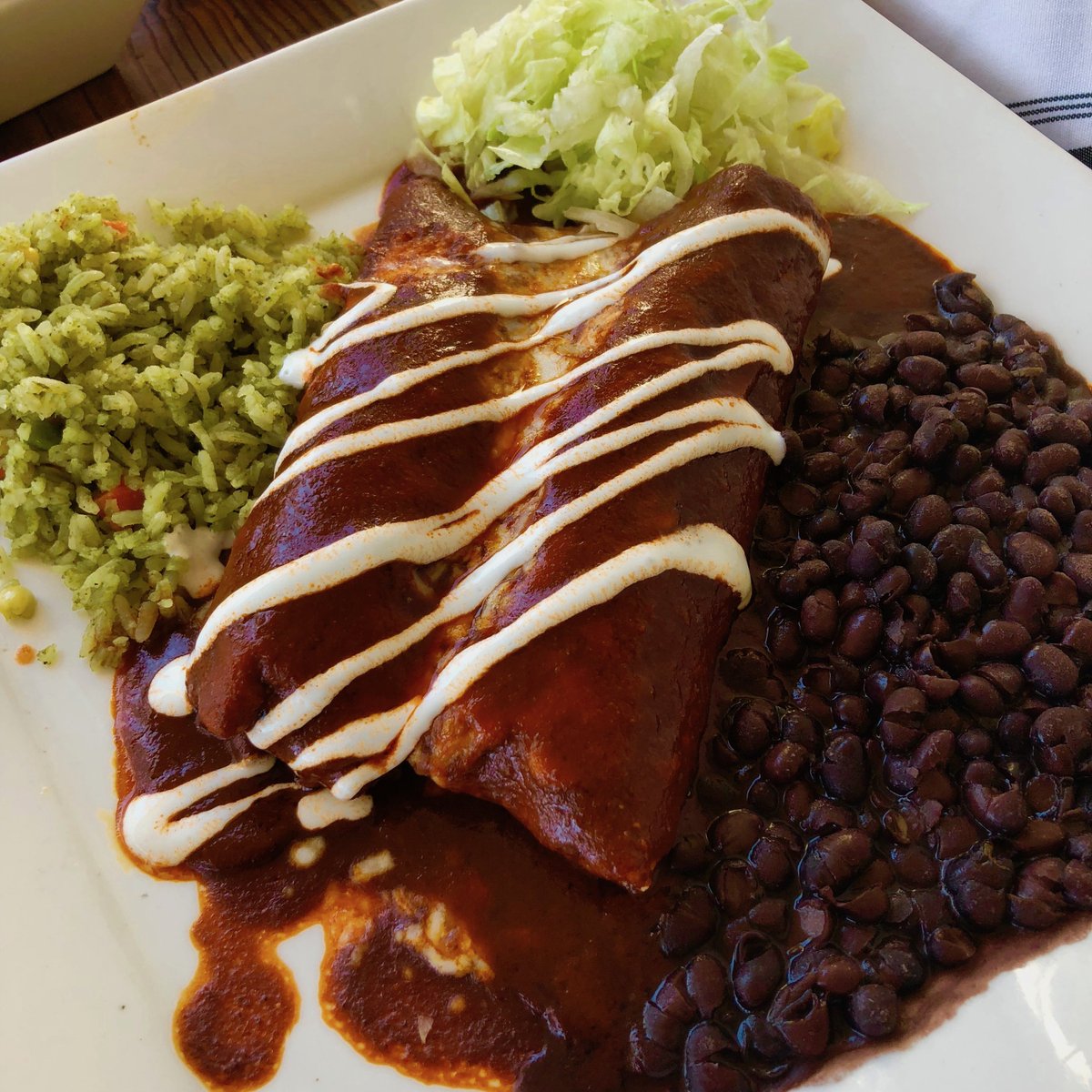 Our Enchiladas Rojas, served with arroz verde and frijoles de la olla, are a great remedy for this cold and rainy day. Come on down and give them a try! #lunamex #mexicanfood #clean #authentic #local #sanjose #enchilladas #glutenfree