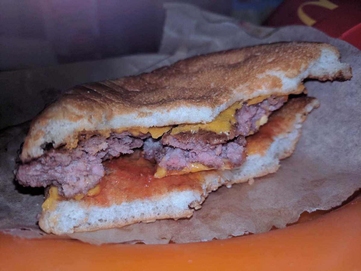 grahamatc's tweet photo. @McDonalds are you serving your burgers medium rare now?  Also forgot our kids yogurt in the happy meal #mcdonaldsfail https://t.co/yPpOMvm9iM