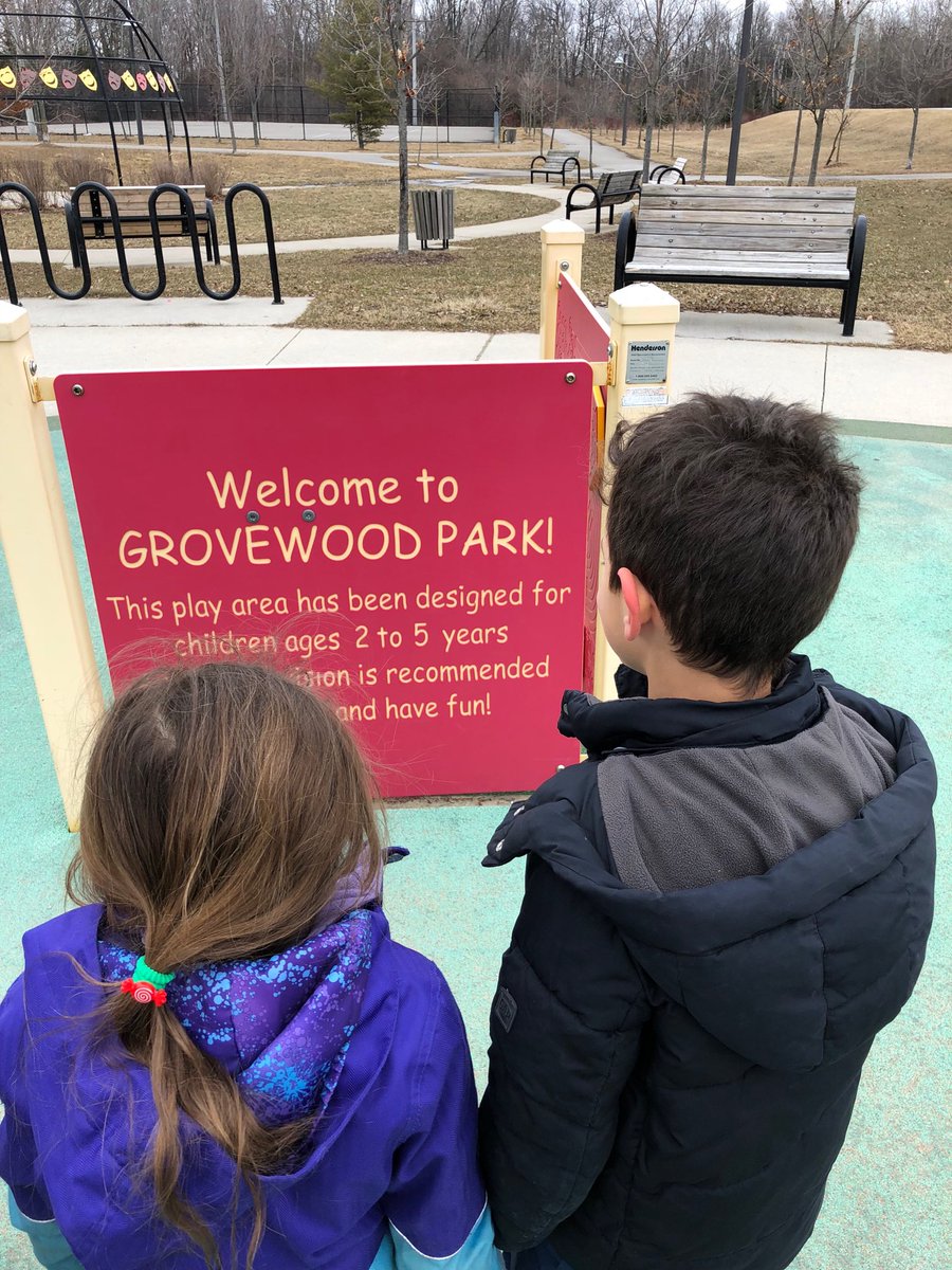 A 6 year old and a 6 year old to be (March) reading the sign at the park.  Mmmm...they are not sure what to think about this?? <a href="/FFMcGinn/">Mike McGinn</a>