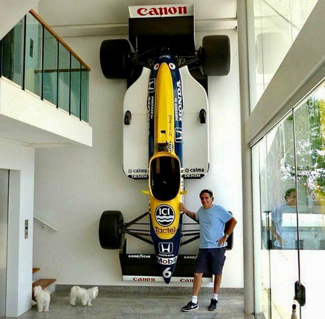 Adelaide GP on Twitter: "Nelson Piquet with his 1987 championship-winning  Williams FW11B hanging on the wall of his home in Brasilia. Feature on  where the winners of the Adelaide Grand Prix are