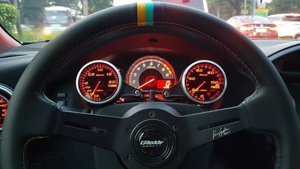 PASMAG's tweet photo. ian loves the look of the KG2 wheel in his cockpit. Shout-out to 86 Speed for making a speedy delivery when he was in the US. #pasmag #pasmagdealer #86speed #gt86 #86 #brz #frs #greddy #kengushi https://t.co/ryuCM7AmUl