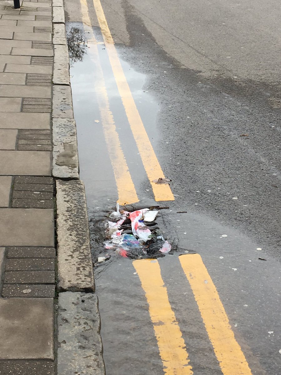 PaulaLabour's tweet photo. Stewart Rd still under water, despite Cllr Aydin Dickerdem reporting leak on Tuesday. Road close to railway and in danger of subsidence. Why the delay @thameswater? This is a priority! (Rubbish blocking drain wouldn’t happen if Tory controlled council put bins in the area!) https://t.co/2mUMrxGt9W