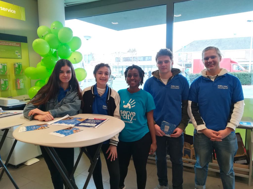 UWC_Maastricht's tweet photo. On this @NLDOET many of our MYP4&5 & DP students volunteer with @STCMaastricht on the #Ympact Food Bank project to collect items in the stores and distribute them in #maastricht #servethecity #uwcwithnldoet #servicelearning #celebratingcommunity @OranjeFonds @UWC_IO @UWC_NL https://t.co/zYXoRibaH4