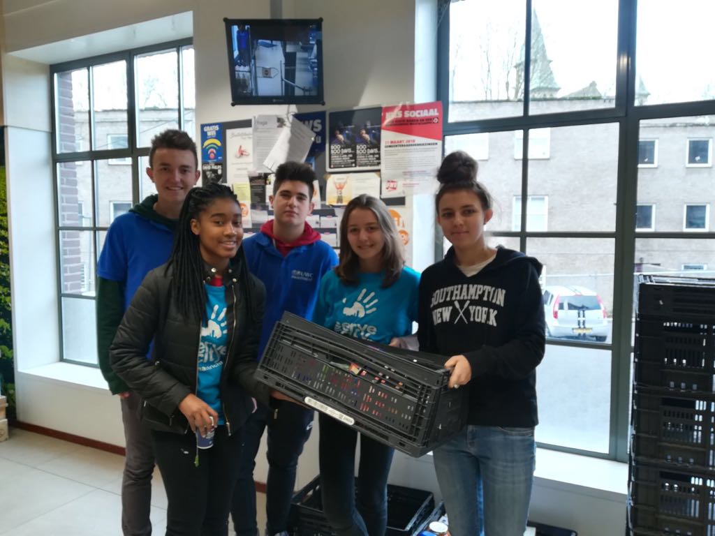 UWC_Maastricht's tweet photo. On this @NLDOET many of our MYP4&5 & DP students volunteer with @STCMaastricht on the #Ympact Food Bank project to collect items in the stores and distribute them in #maastricht #servethecity #uwcwithnldoet #servicelearning #celebratingcommunity @OranjeFonds @UWC_IO @UWC_NL https://t.co/zYXoRibaH4