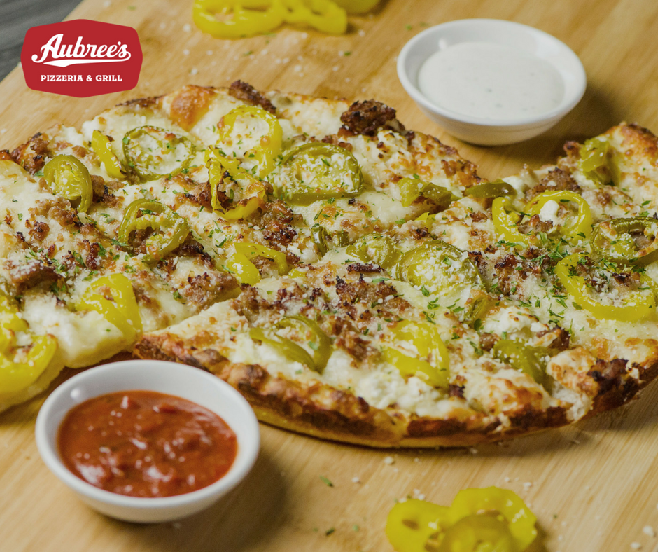 AubreesMI's tweet photo. Did you know you can add toppings to Aubree's Ultimate Feta Bread? Yellow peppers, bacon, and jalapeรฑo are popular with guests! #youfetabelieveit #aubrees #aubreesmi #fetabread https://t.co/VFkCG2MTjU