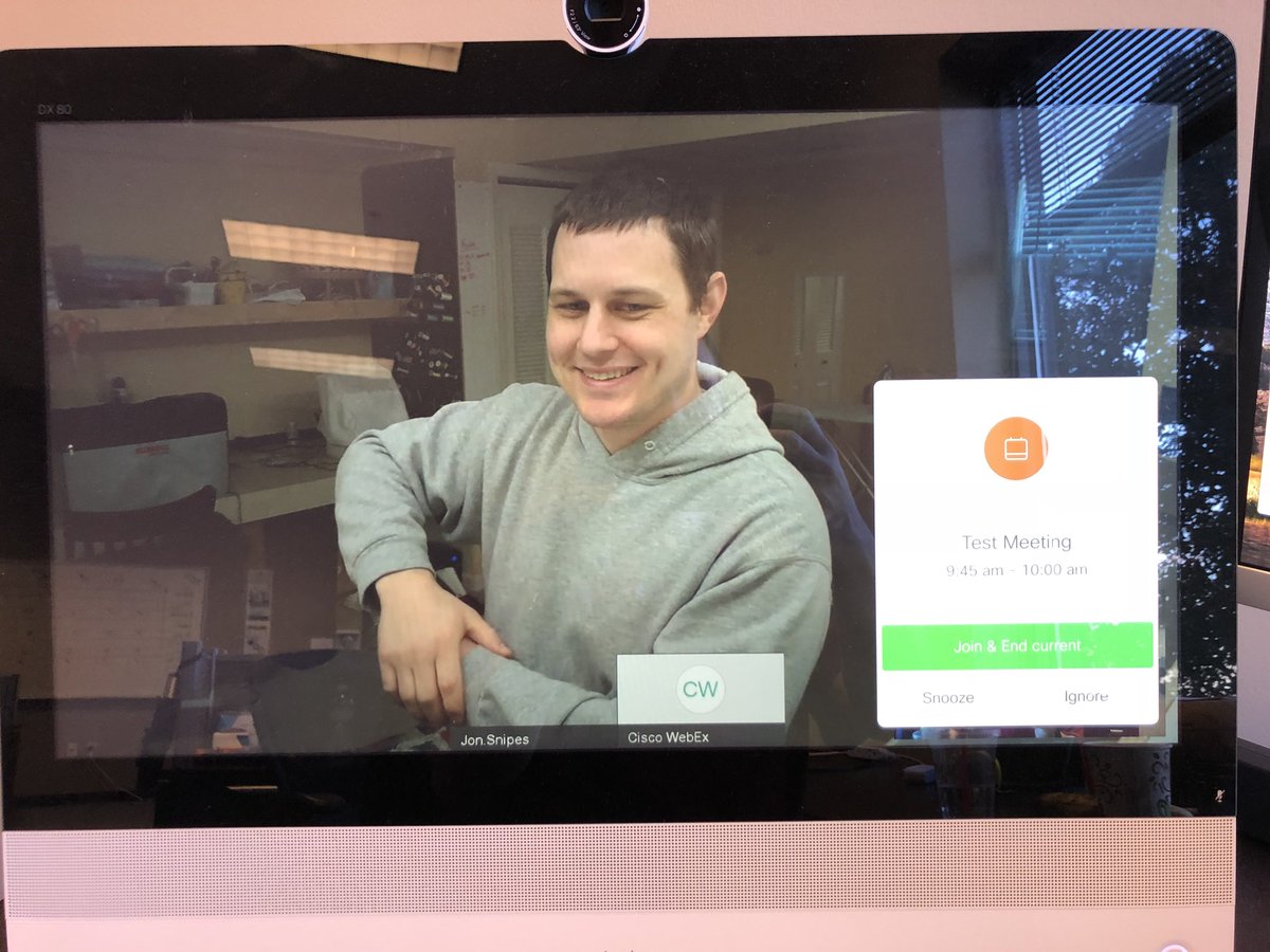 WriteErase's tweet photo. Testing One Button To Push with a goofy @JonsCollabLab on my @CiscoSpark registered DX80! OBTP now works with both Spark AND WebEx meetings with the Hybrid Calendar Service. No TMS required for Spark Regβd Endpoints! #ROVESOLUTIONS @CiscoChampion https://t.co/6nioXjLEM2