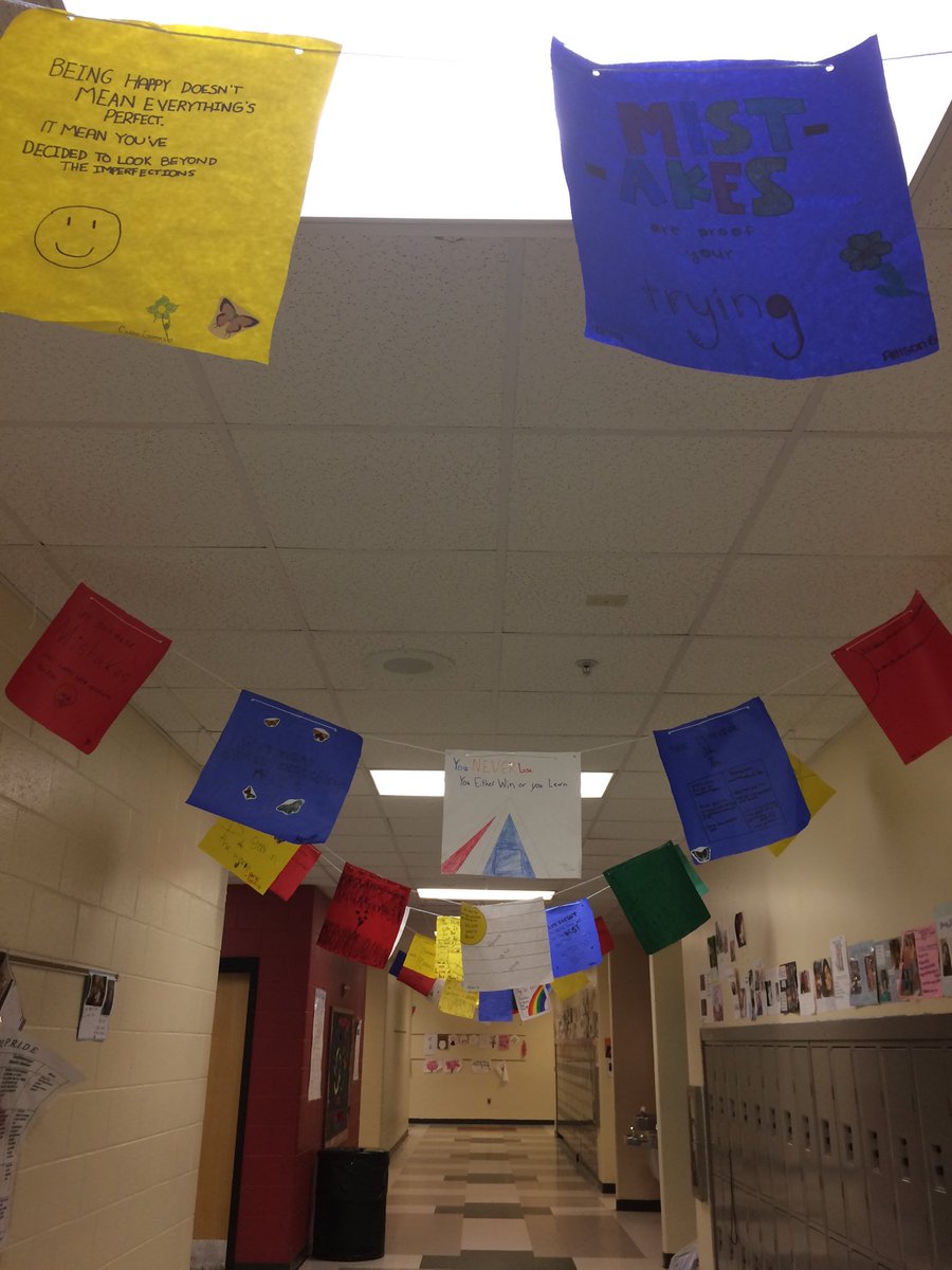 Peace flags are up in the 7th grade hall for Everest Day!! @HMSMustangPride #whatsyoureverest
