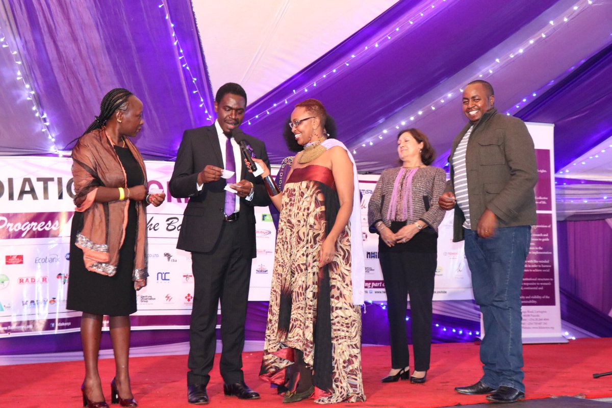 fidakenya's tweet photo. @NelsonHavi reading out ticket raffles @reneengamau 
#FIDADinnerEvent https://t.co/fPPXY7qA56