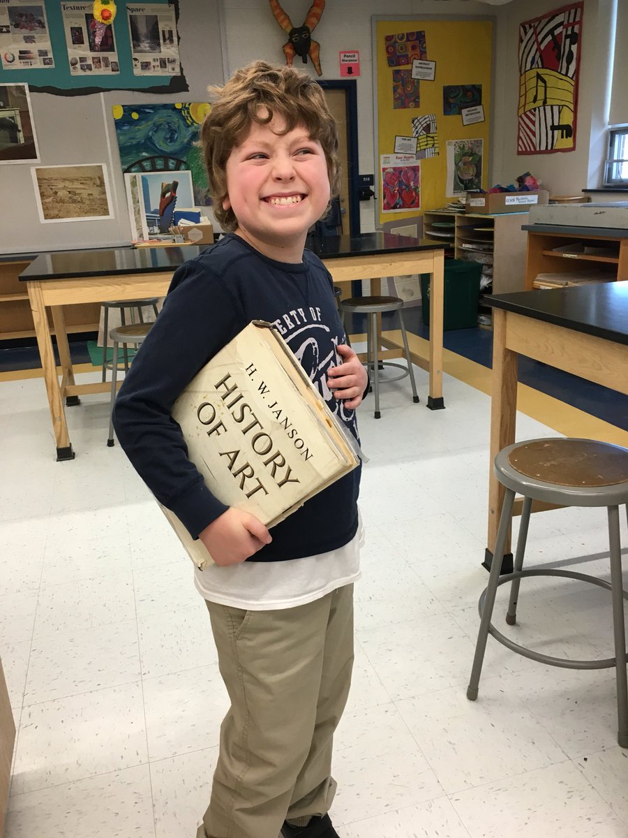 Aidan just loves looking through my art books from long ago art school. What an endearing smile!!