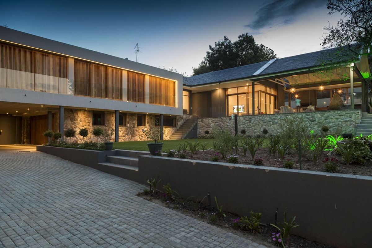WalrasGroup's tweet photo. Walras recently completed this magnificent house in #illovo #johannesburg with Korina Holley architects. The design masterfully blends listed joburg heritage with modern classic. #walras #construction #residential #architecture https://t.co/3wqb9lzjrv