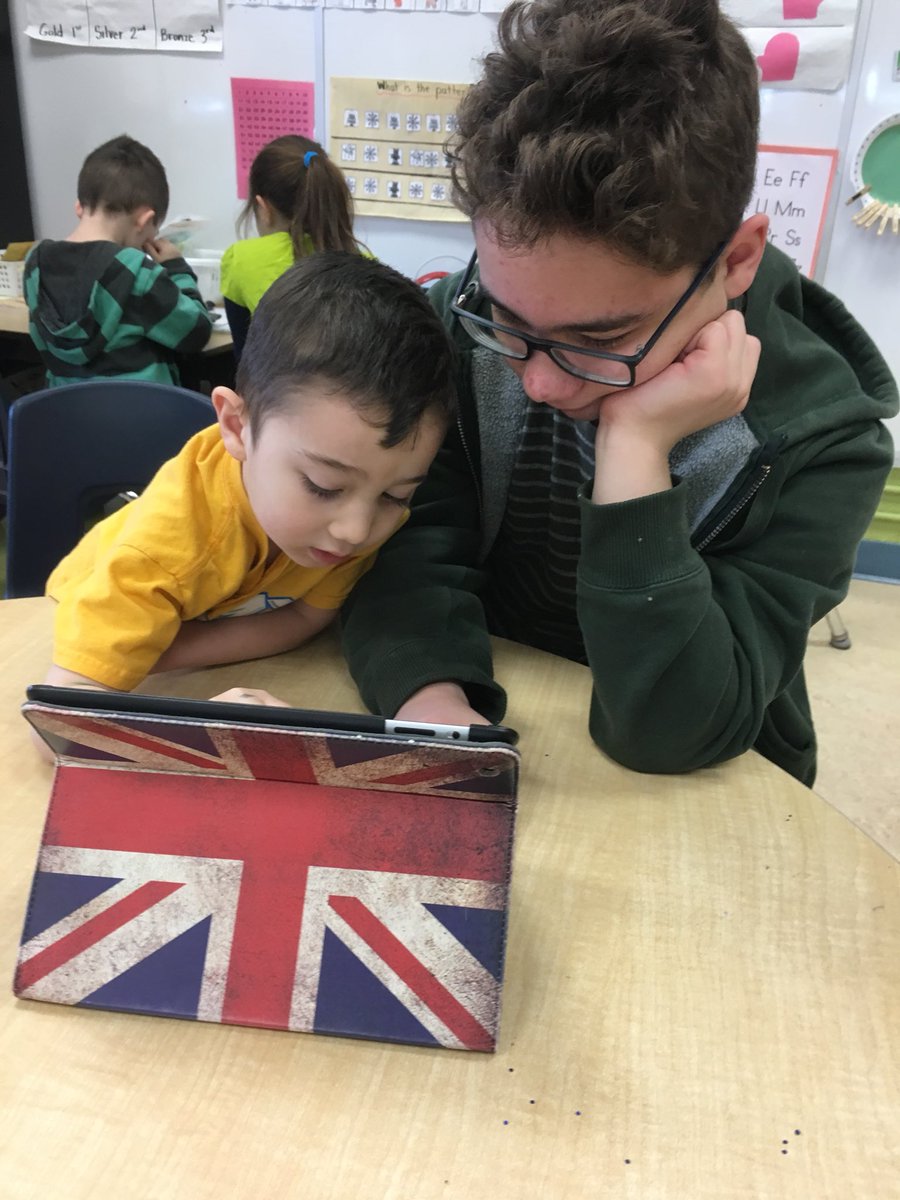 mrs_degraw's tweet photo. Brothers cozying up together during our tech time with Miss Spencer’s class. 😃 https://t.co/9BNuZmfDZV