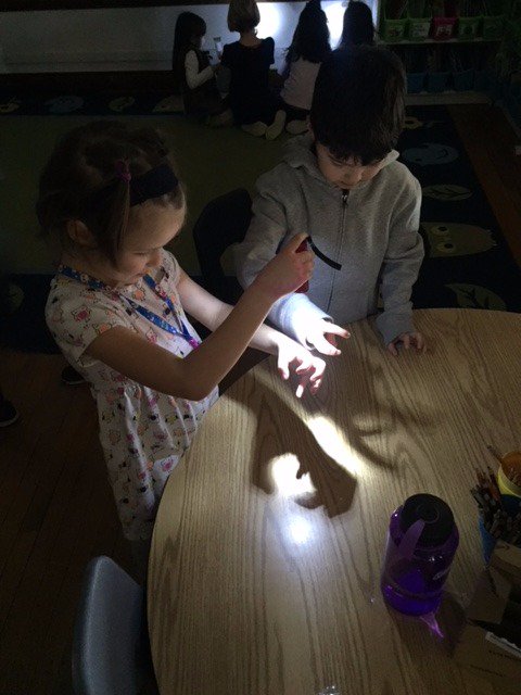First graders exploring shadows as part of the Sound and Light unit in science. #goCPS