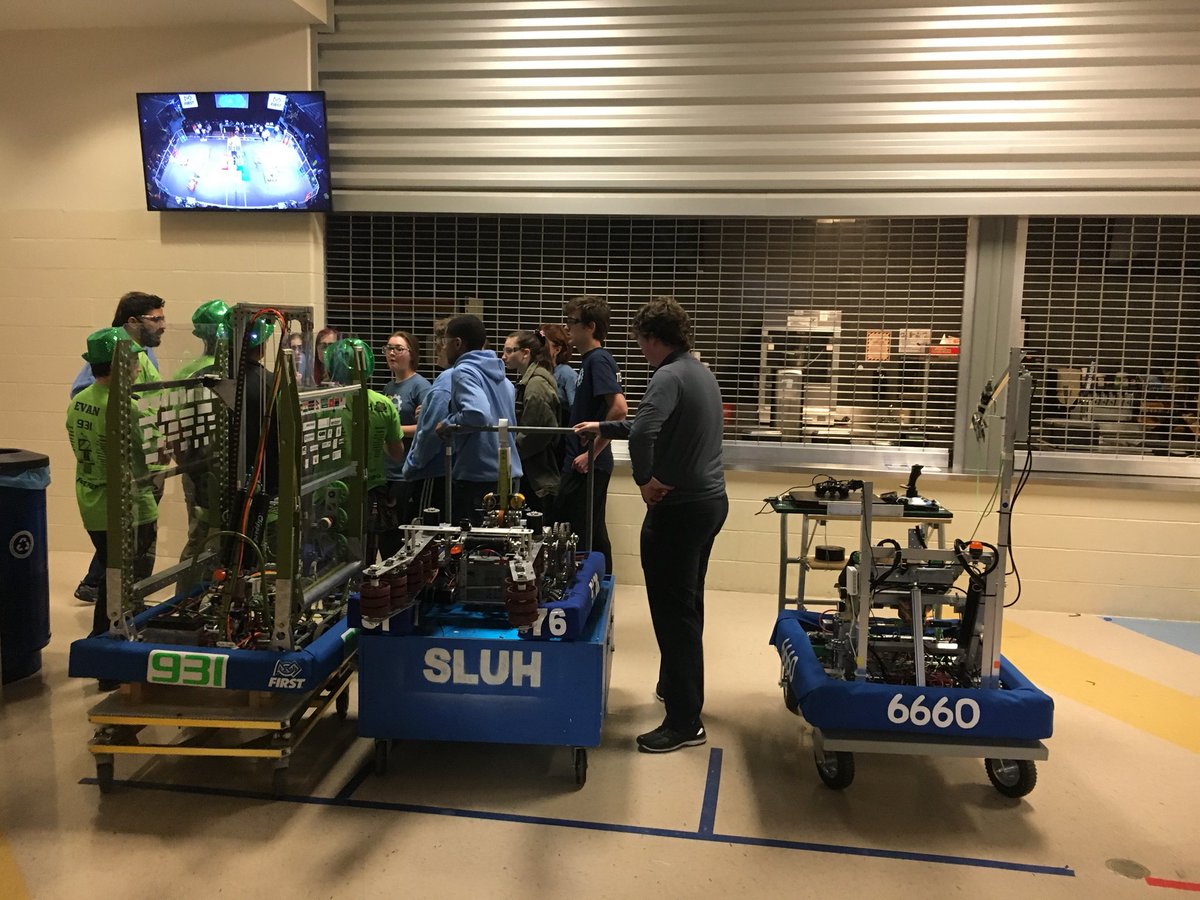 The alliance meeting for the blue team’s three robots.  AMDG
