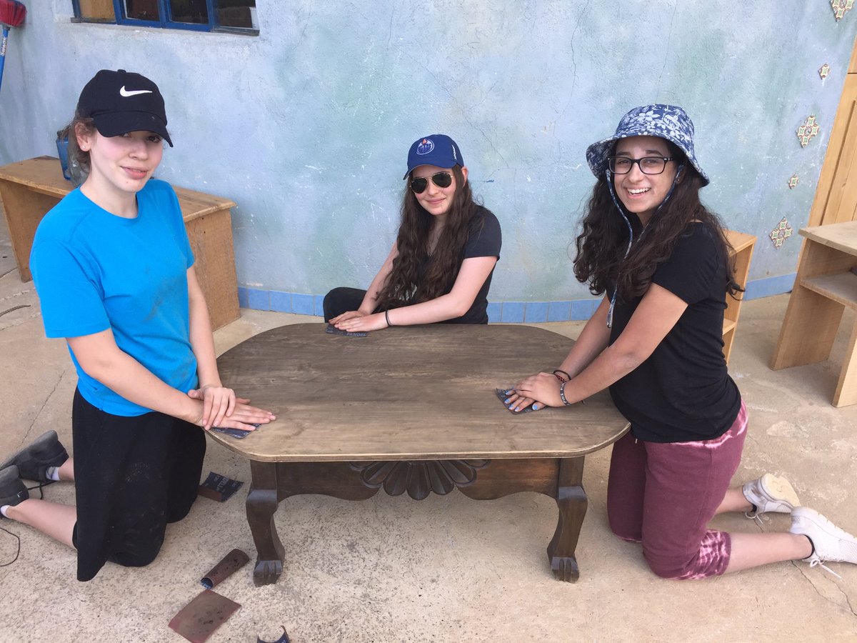 So for your next woodwork sanding project we have a trained team. These are outside tables and need sanding and varnishing every year due to the hot sun. I know some of our kids wish they could return annually to do it!