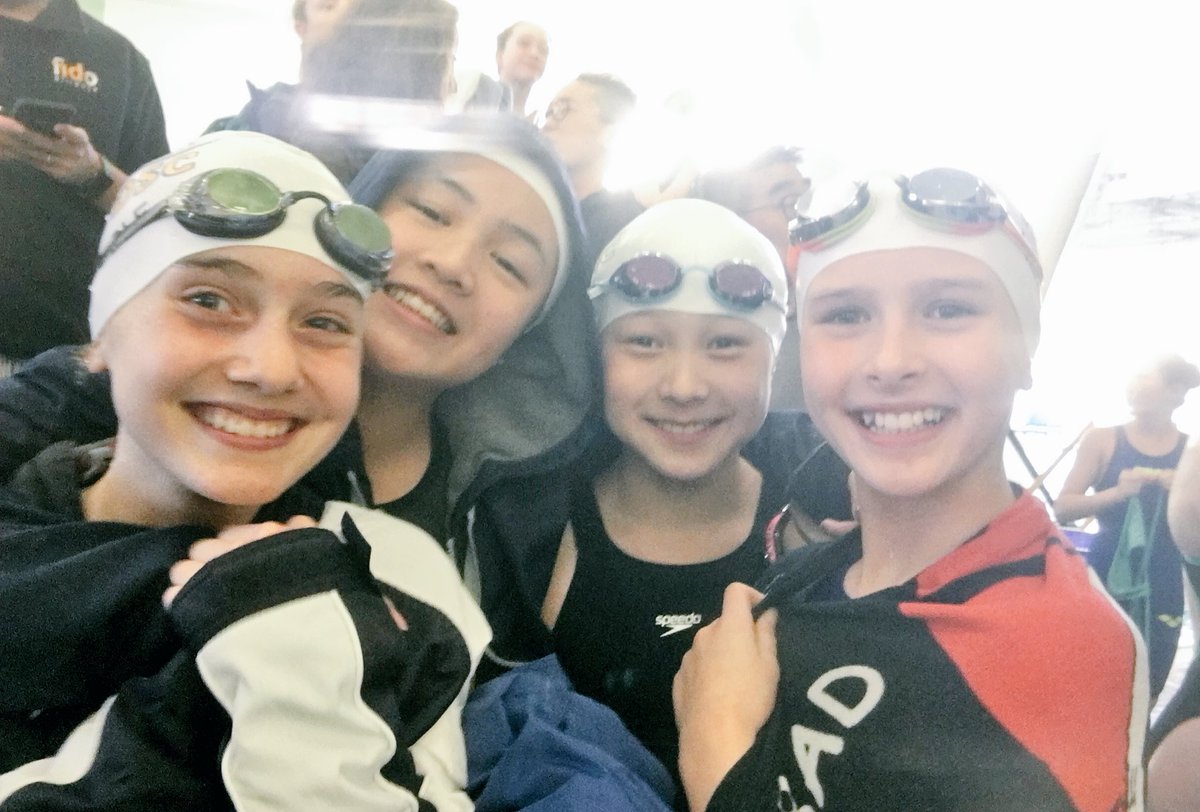 WinskillDolphin's tweet photo. (Left to right) Heidi Jenna Yinan and Brooke finish off the first day of #TierIChamps with a 4” PB in their 4x50 Free Relay finishing 23rd overall!! #dolphination https://t.co/JzNRrqEUEz