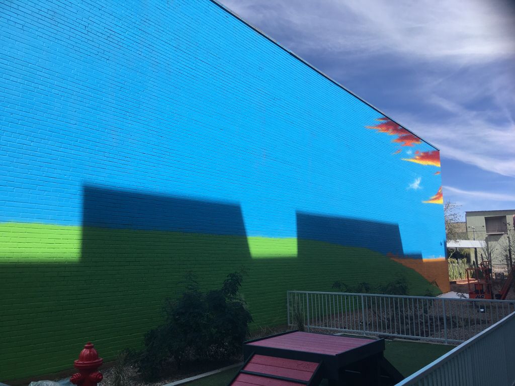 CuratorEngine's tweet photo. This mural is no small feat - it’s a good thing we’ve got the best artists to tackle the job! Tato’s work in progress at Muse Apartments. https://t.co/z3HzIWIdGE