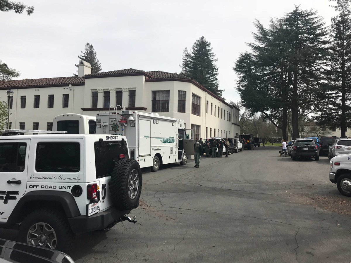 sfchronicle's tweet photo. @MyCalVet Law enforcement officers and first responders at the #Yountville veterans home during Friday's hostage standoff. https://t.co/AAWpJjE4EP