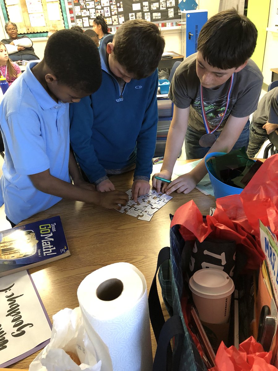 MandyBarrett8's tweet photo. My s working as a team to try to Crack the Code using their geometry skills! #wearesses https://t.co/gvGvXmRSus