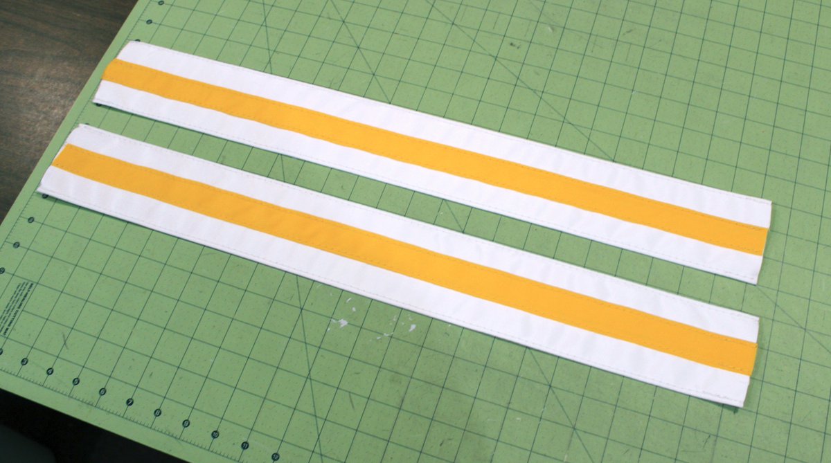 PAWhockey's tweet photo. Custom padding made to create a professor strap in a set of pads that didn't have it already, and some stripes to sew onto a pant shell. If you need a custom part, I can make it! #truecustom #PAWhockey #PAWsome https://t.co/rMOgNFKMYc