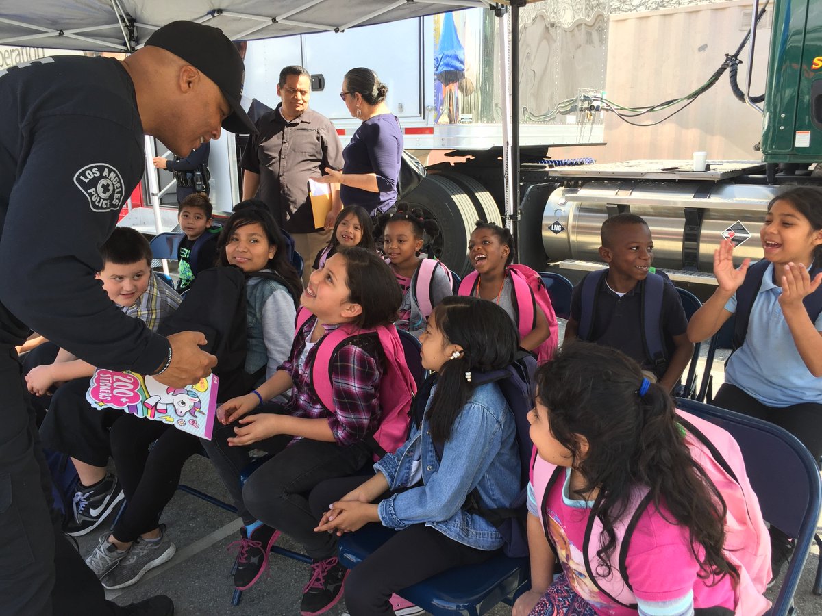 LAPDSouthTraff's tweet photo. @LAPDSouthTraff officers helped with "Operation School Bell" today giving elementary school children new shoes, uniforms, backpacks, books, and school supplies. Good job officers! #CommunityEngagement #ServiceToOurCommunities #SouthTrafficCTSU #LAPDACOPS https://t.co/fXEt0b79U7