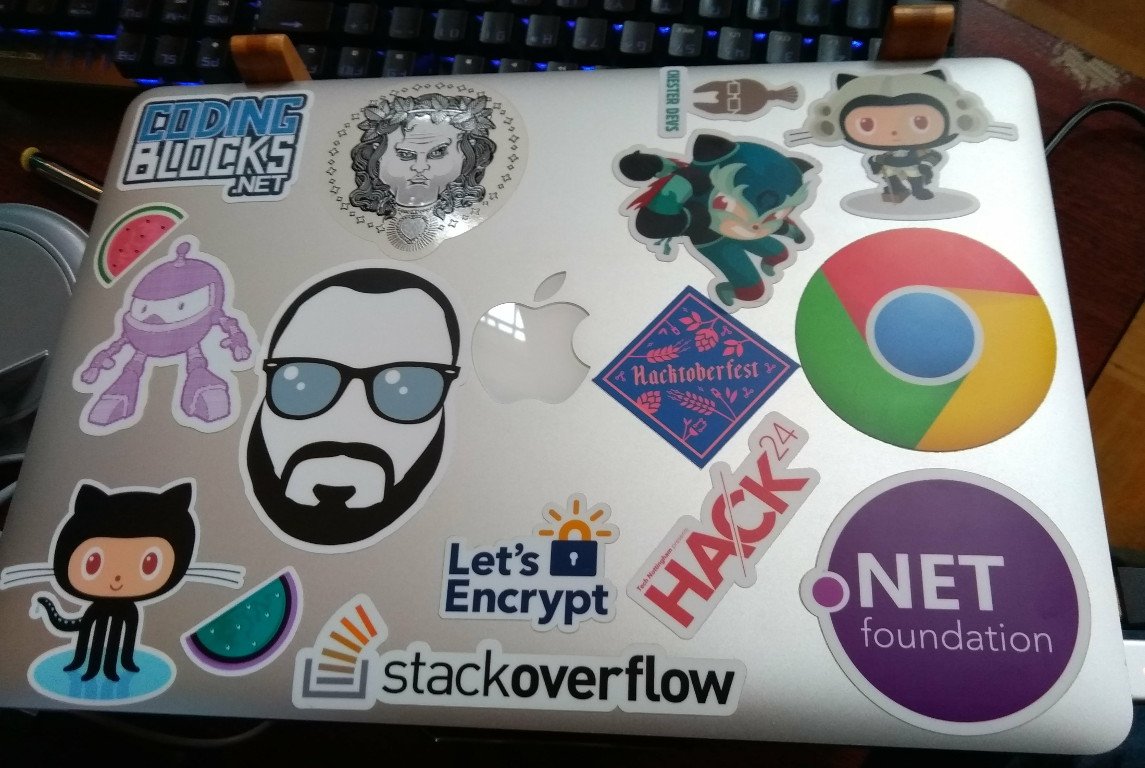 dotNetCoreShow's tweet photo. My laptop is now running 400% faster, and looks 2000% better after applying a #CynicalDeveloper sticker to it at #Hack24
It's in good company, too. Reply to this tweet, if you know all of them. https://t.co/gQWVCLfzA2