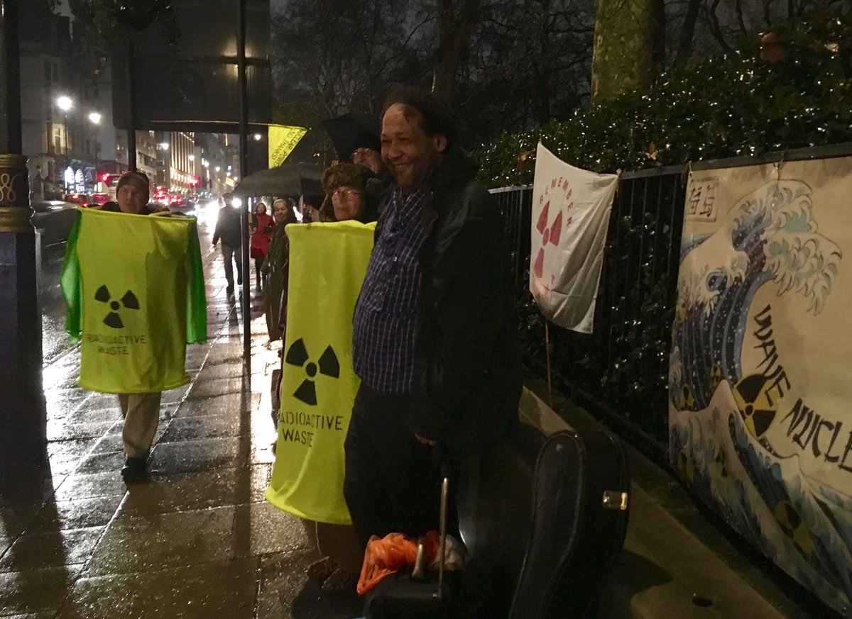 remembFukushima's tweet photo. A big thank you to our friends at @stophinkley for coming from Somerset for our Remember Fukushima Vigil 9/3/18 with banners &amp; wearable ☢️waste barrels which highlight the unacceptable risks posed to all living things by ☢️waste, a toxic legacy for many generations to come https://t.co/NYoBYwwUJ0