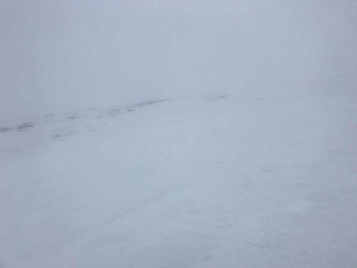 CEMEXUKAsphalt's tweet photo. #whiteout has put a stop to the troops an agonising 100m from the top!! #viaflow laid up #Snowdon would probably have paved an easier way. @CEMEX_UK #safetyfirst https://t.co/W2XeWOLC2U