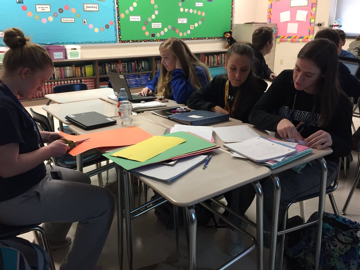 Pd. 7/8 designing their Anglo-Saxon tribes to go w/ our reading of Beowulf. My first attempt at #gamification... tribes compete to complete the hero’s journey (game board is in the background). Kids are excited and so am I! <a href="/mrmatera/">Michael Matera</a> <a href="/burgessdave/">Dave Burgess</a> #xplap #tlap #RAMSpride