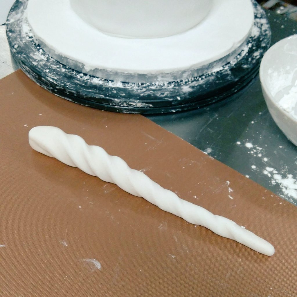 Cheese twist style unicorn horn. 
Me: Wow! How did you do that? 
Student: I'm honestly not sure... 😕