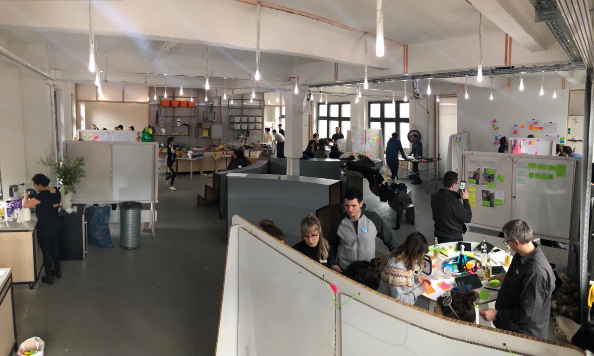 Teams are back from research, building their personas and HMWs #GSJam