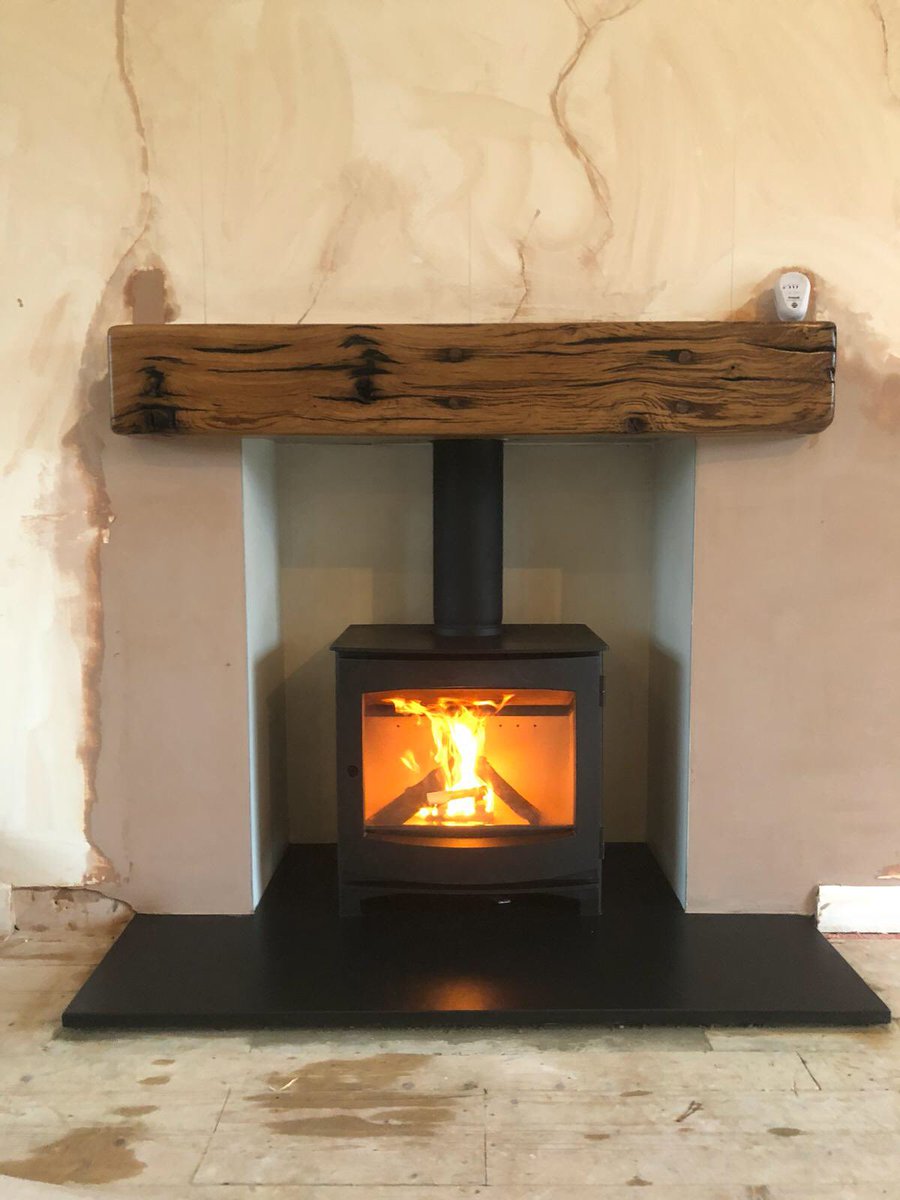 Dik Guerts Ivar 8 Low Woodburning Stove with slate hearth &amp; sleeper beam fully fitted by us.<a href="/Drugasar_UK/">DRU Fires</a>