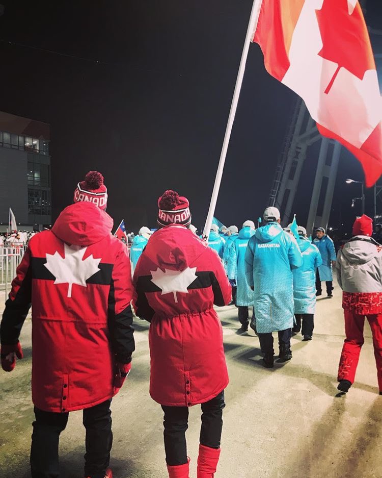 skateandshine's tweet photo. New pic of #VirtueMoir carrying the Canadian flag at the opening ceremony (via @TayHenrich) 🇨🇦 #goingonstrong https://t.co/6cqvCizzc8