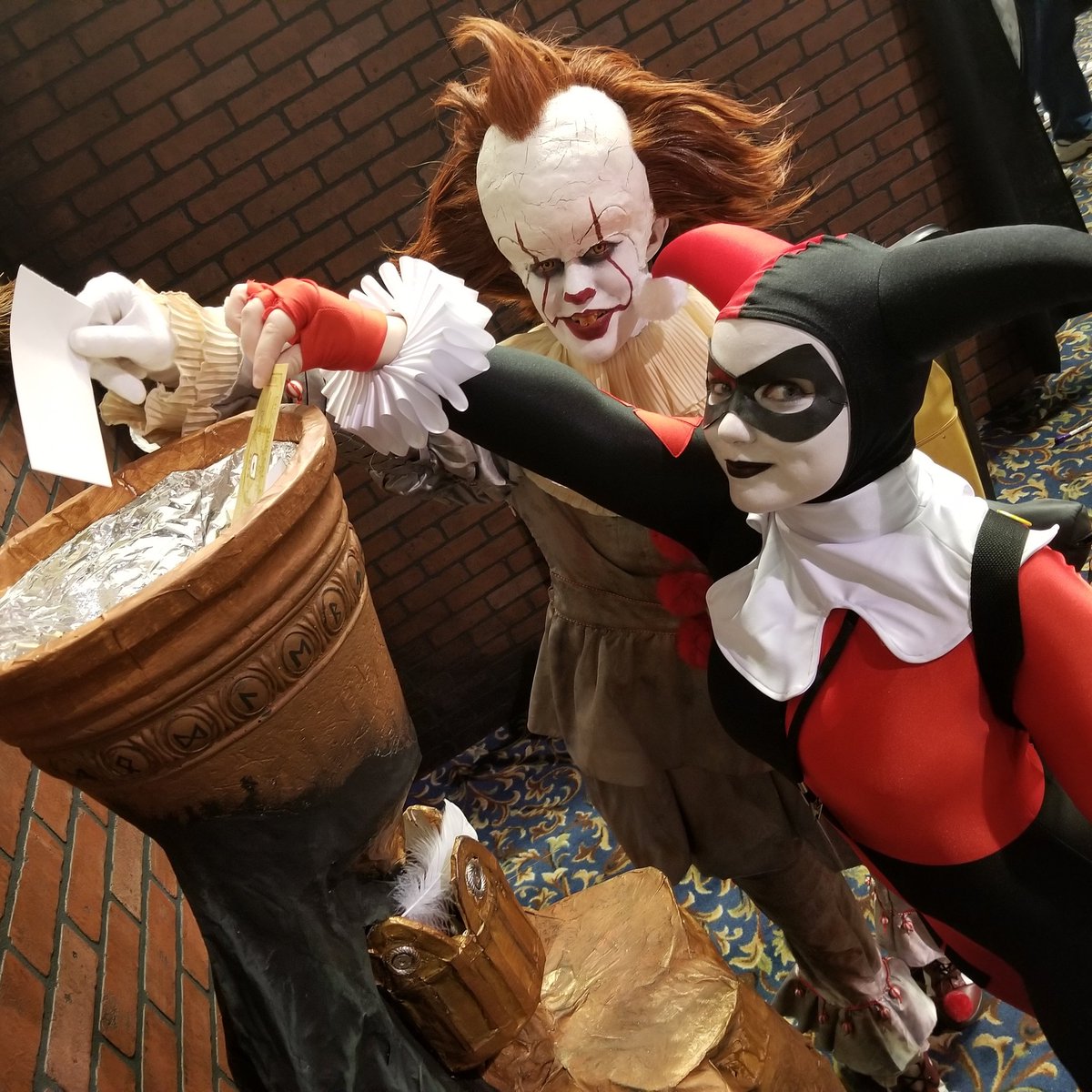 wizardfestohio's tweet photo. Harley Quinn and Pennywise drop their names into the Goblet. #iWizard #IrontonWizardFest #iWiz #LCTC2018 @lex_con https://t.co/XZTXByZORk