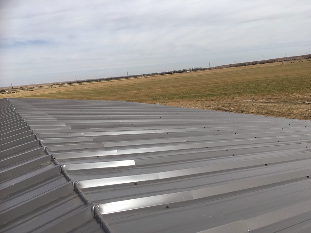 ryanrachaelj's tweet photo. Blessed with a calm morning that was enough to finish the tin! And we’re still on speaking terms. About anything but the barn. 😏 Definitely agree that this is the tallest we ever build by ourselves. 17’ at edges. #agprojects #DoublesAsADeerStand #Over1000Tinscrews #Alfalfa https://t.co/RJ7Xw2QcXb