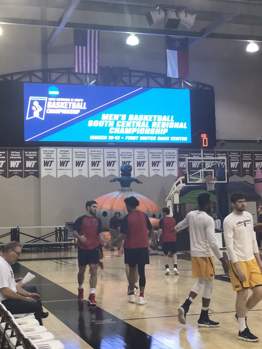 jlivi2's tweet photo. The Jumbotron says it all. And the bouncy houses are inflated and ready to go! #D2MBB #SCRegion tips off now, No. 3 Regis vs. No. 6 Dallas Baptist! @NCAADII https://t.co/GcUADjEWK8