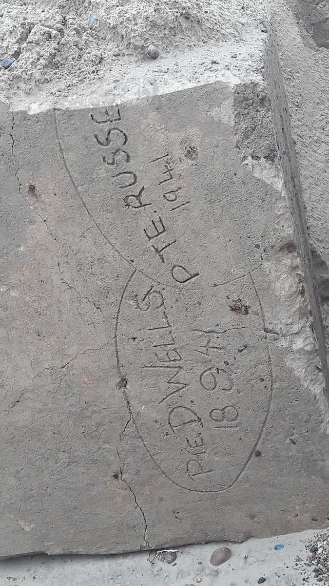 Winterton0nSea's tweet photo. 77 yr old graffiti uncovered after the storms near the tank traps on Winterton beach. Picture taken today (Saturday) by Dale Cudworth. #WintertonOnSea #TankTraps #WorldWar2 #WW2 #Norfolk #c1941 https://t.co/0afnlv9Fqi https://t.co/jTkmbmI68d