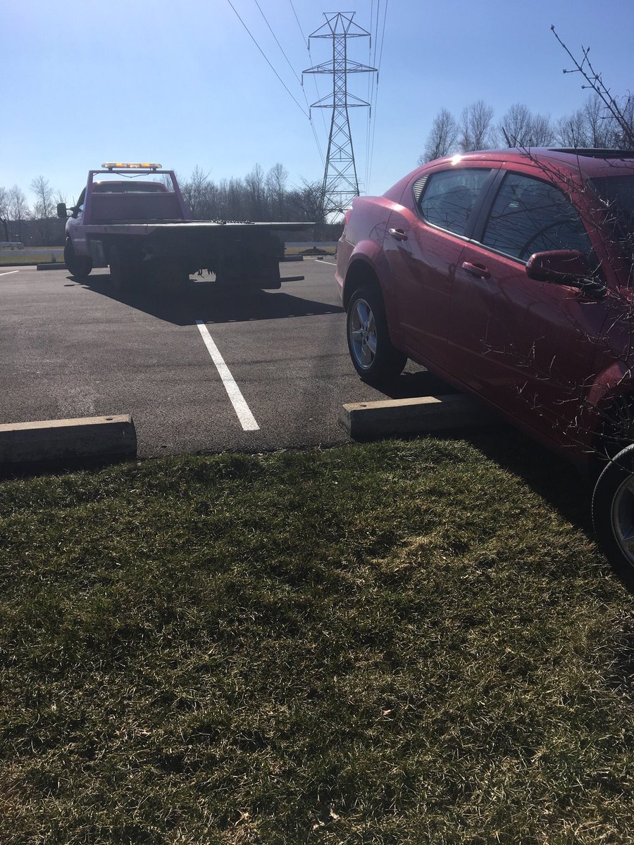 OHFlyerPride's tweet photo. Within 20 minutes of getting her Temps @mayakk310 ended up here. Tow truck driver took pictures he was laughing so much. #drivingprobs https://t.co/Cmuc317Bm1